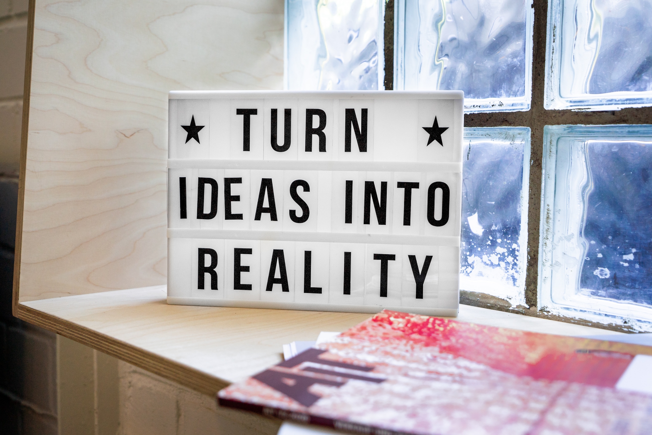 Sign that says "Turn Ideas Into Reality"