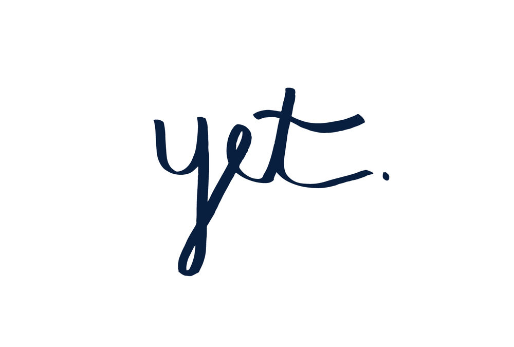 The word "Yet" written in cursive