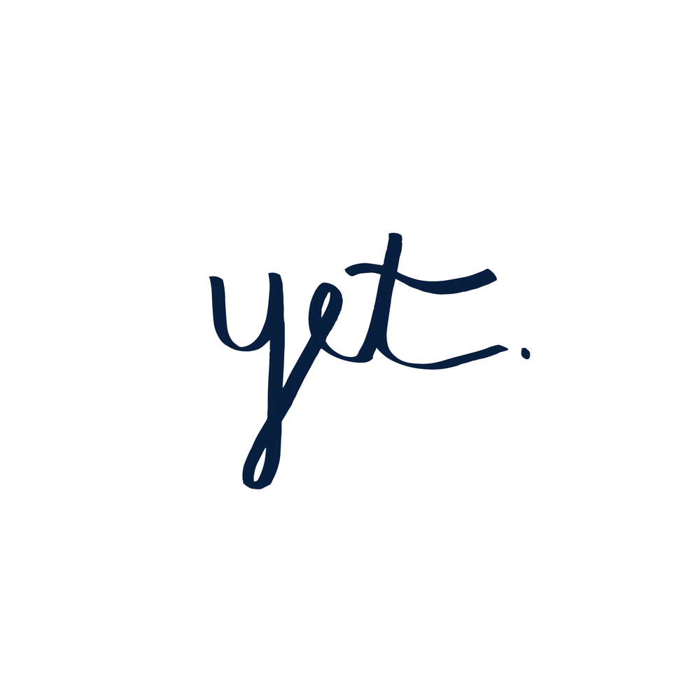 The word "Yet" written in cursive