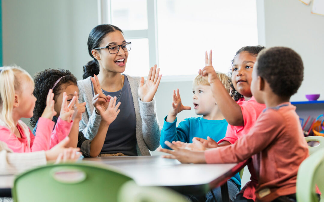 Teacher with young students learning to count