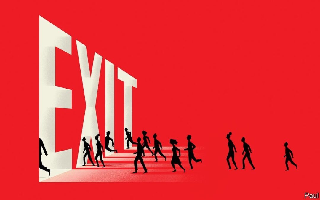 People running to an Exit door