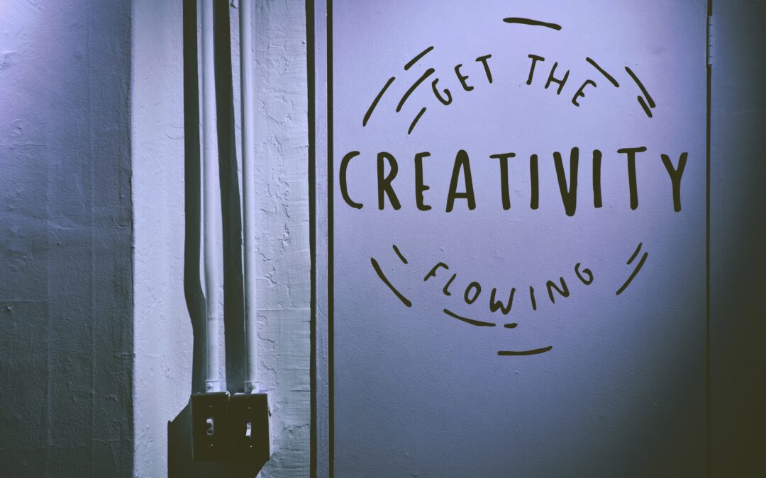"Get the Creativity Flowing" written on a wall