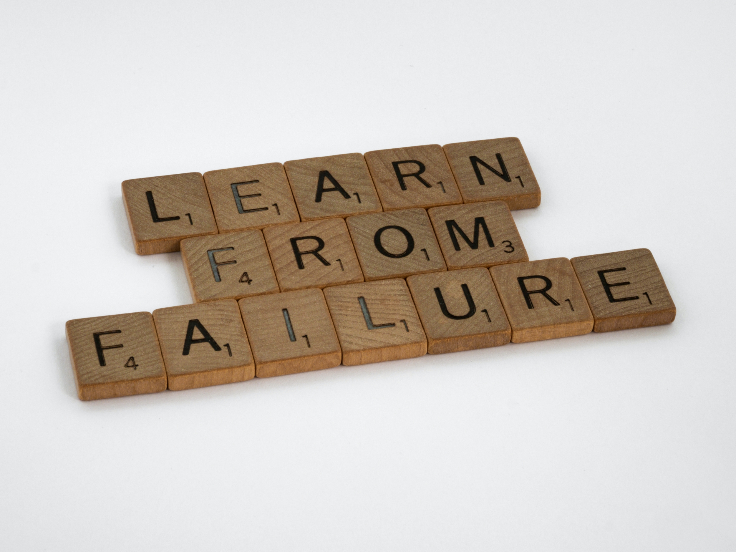 Scrabble tiles that read "Learn From Failure"