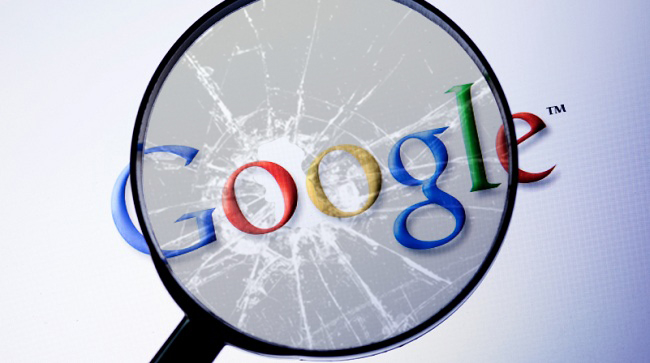 View of the Google logo through a broken magnifying glass