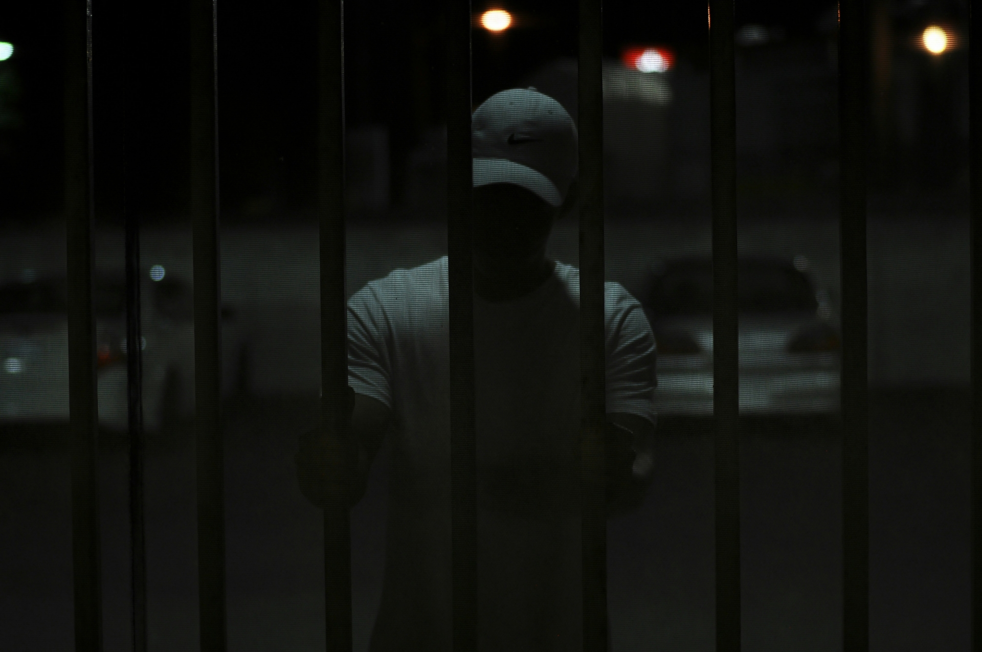 Shadowy figure looking out at the viewer