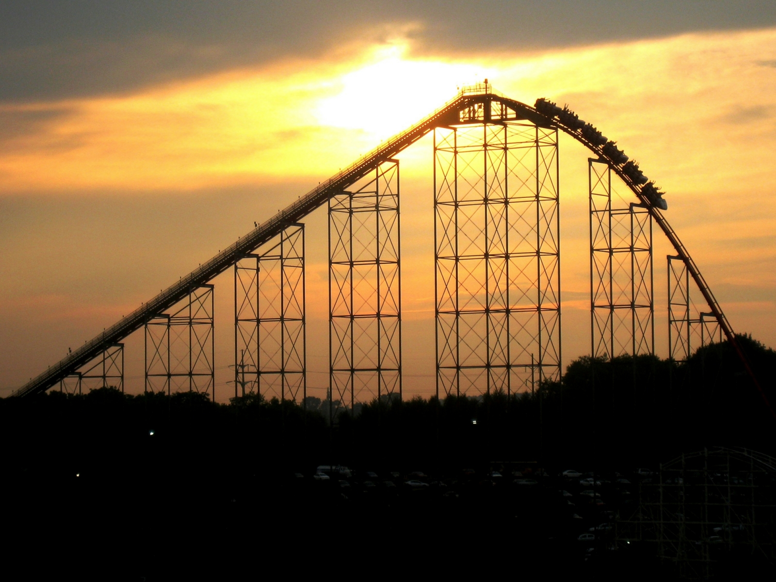 Photo of the first hill of a roller coaster